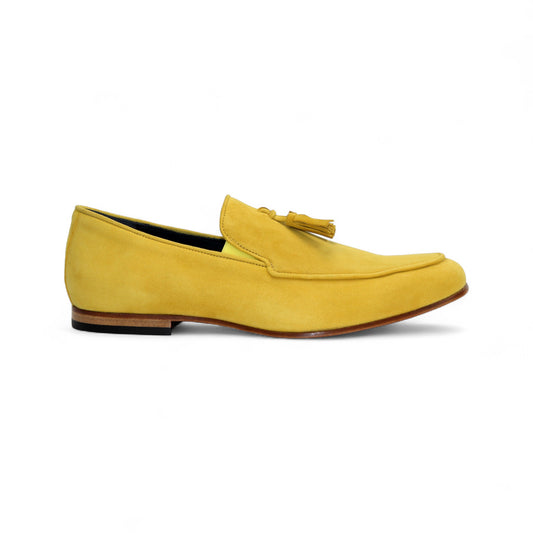 The Duca Di Matiste Duca Anzio Yellow is a single yellow suede loafer made in Italy, featuring a tassel detail, low wooden heel, and stitched trim, shown in profile against a white background.