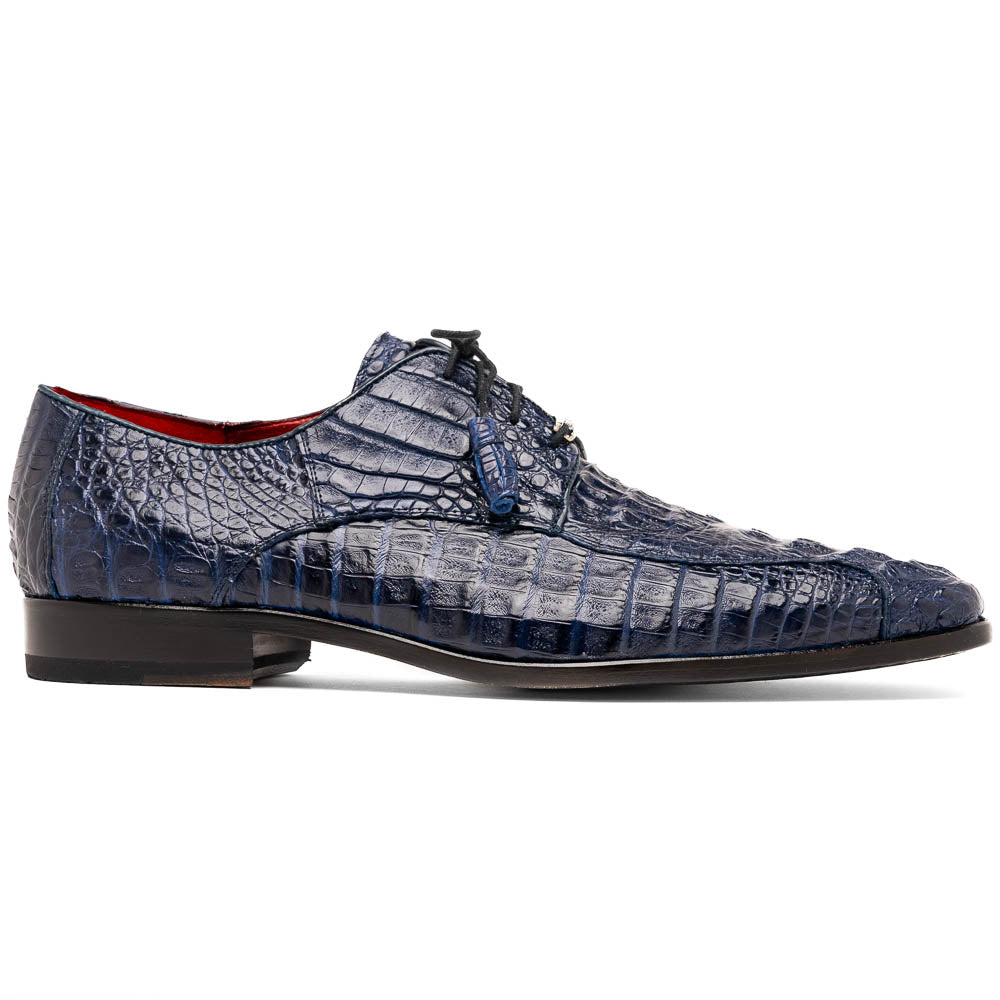 A pair of Marco Di Milano Apricena Midnight Blue caiman crocodile derby shoes, one upright and the other on its side showing the sole, with black laces for a luxury dress look.