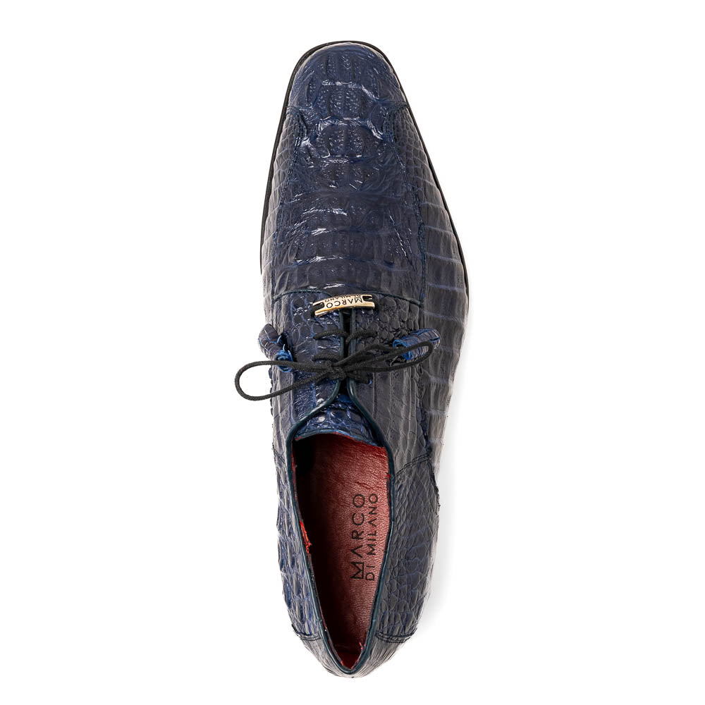 A pair of Marco Di Milano Apricena Midnight Blue caiman crocodile derby shoes, one upright and the other on its side showing the sole, with black laces for a luxury dress look.