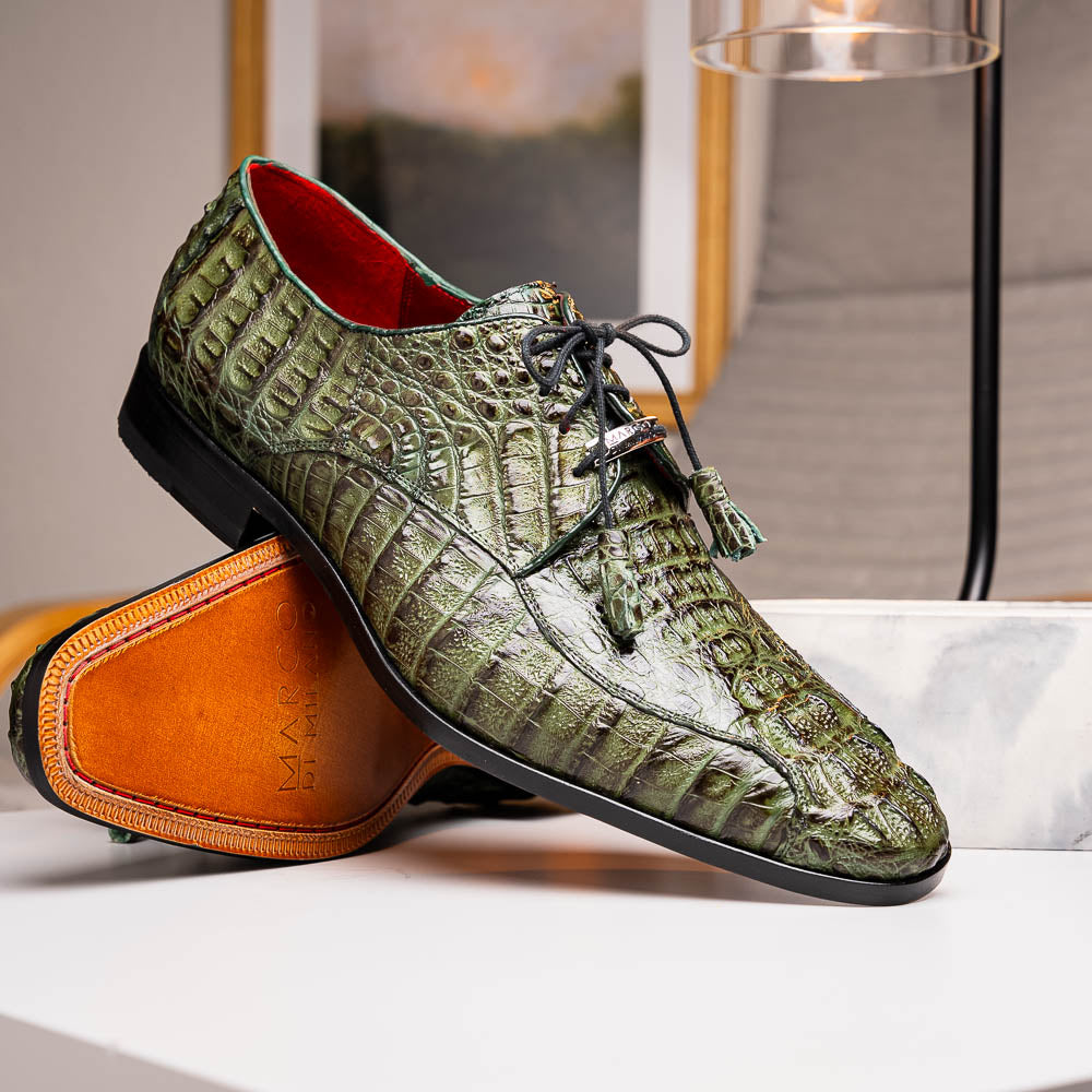 The Apricena Woodgreen by Marco Di Milano features genuine caiman leather in green, black laces, a red inner lining, and brown leather soles—ideal for a luxury dress derby style.