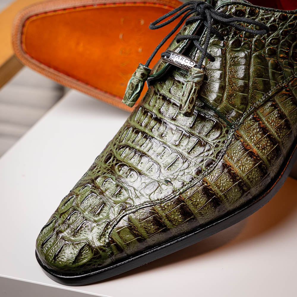 The Apricena Woodgreen by Marco Di Milano features genuine caiman leather in green, black laces, a red inner lining, and brown leather soles—ideal for a luxury dress derby style.