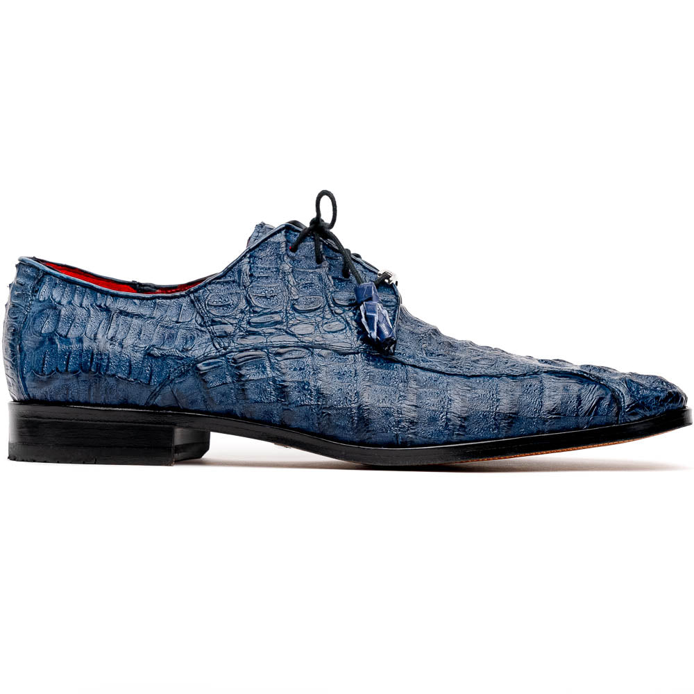 The Apricena Navy by Marco Di Milano are blue textured luxury men's dress shoes with black laces, red interior lining, and branded tan leather soles—crafted to evoke the refined look of genuine caiman crocodile shoes.