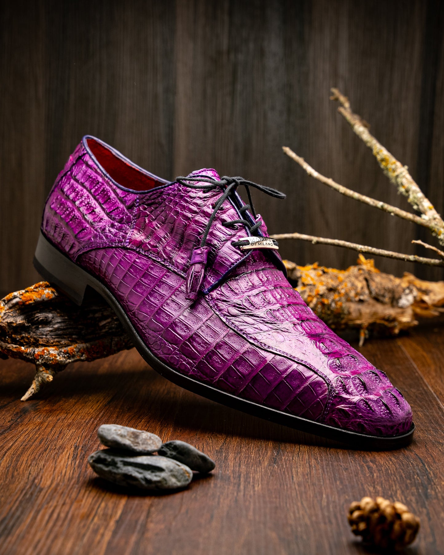 The Marco Di Milano Apricena Purple shoes feature genuine caiman crocodile leather, black laces, and a polished finish—one upright and one showing the sole—making them an exquisite luxury derby choice.
