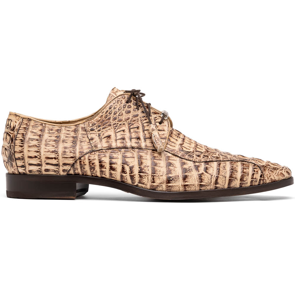 A pair of Marco Di Milano Apricena Rustic Orix luxury dress shoes in beige crocodile pattern, one upright and one on its side revealing the brown sole with embossed branding. Made from genuine caiman crocodile leather for an elegant finish.