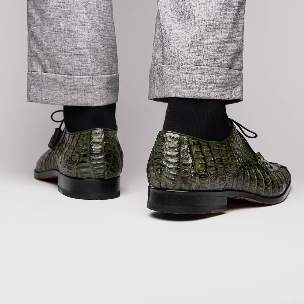 The Apricena Woodgreen by Marco Di Milano features genuine caiman leather in green, black laces, a red inner lining, and brown leather soles—ideal for a luxury dress derby style.