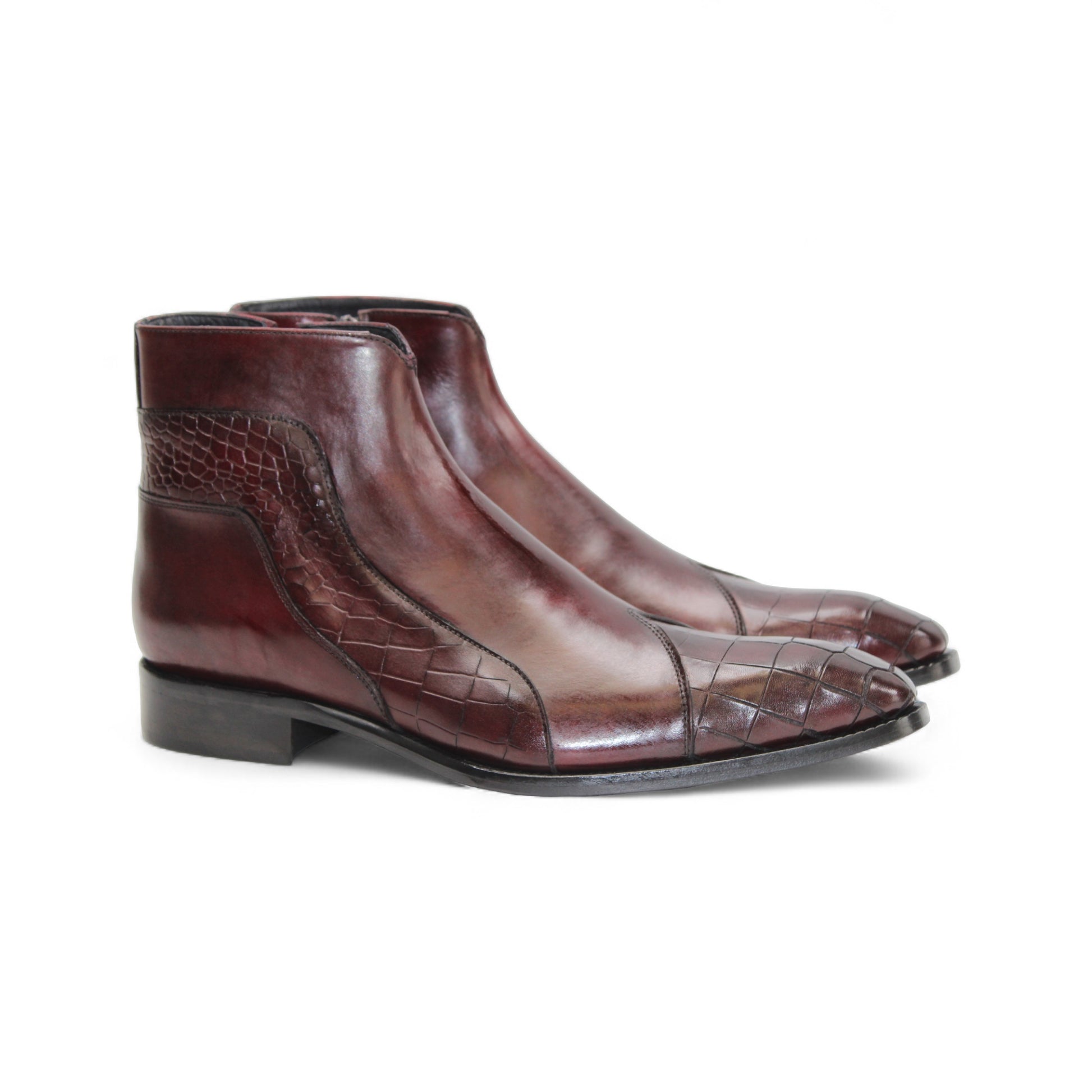 The Duca Di Matiste Duca Aprilia Burgundy/Antique Red is a single burgundy ankle boot with a low heel, featuring croco embossed detailing on the side and toe, displayed against a white background.