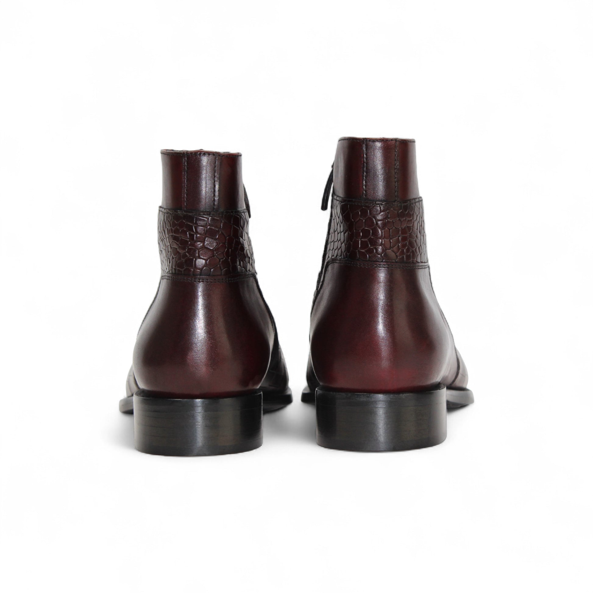 The Duca Di Matiste Duca Aprilia Burgundy/Antique Red is a single burgundy ankle boot with a low heel, featuring croco embossed detailing on the side and toe, displayed against a white background.