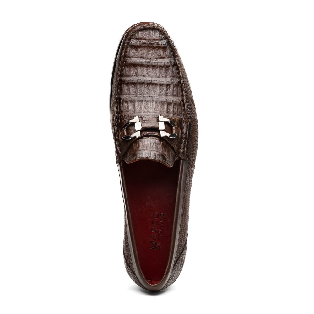Introducing the Adro Brown by Marco Di Milano—crafted in brown leather with crocodile texture, silver buckle, red interior lining, and signature sole logo. A luxurious choice for those who value genuine exotic design.