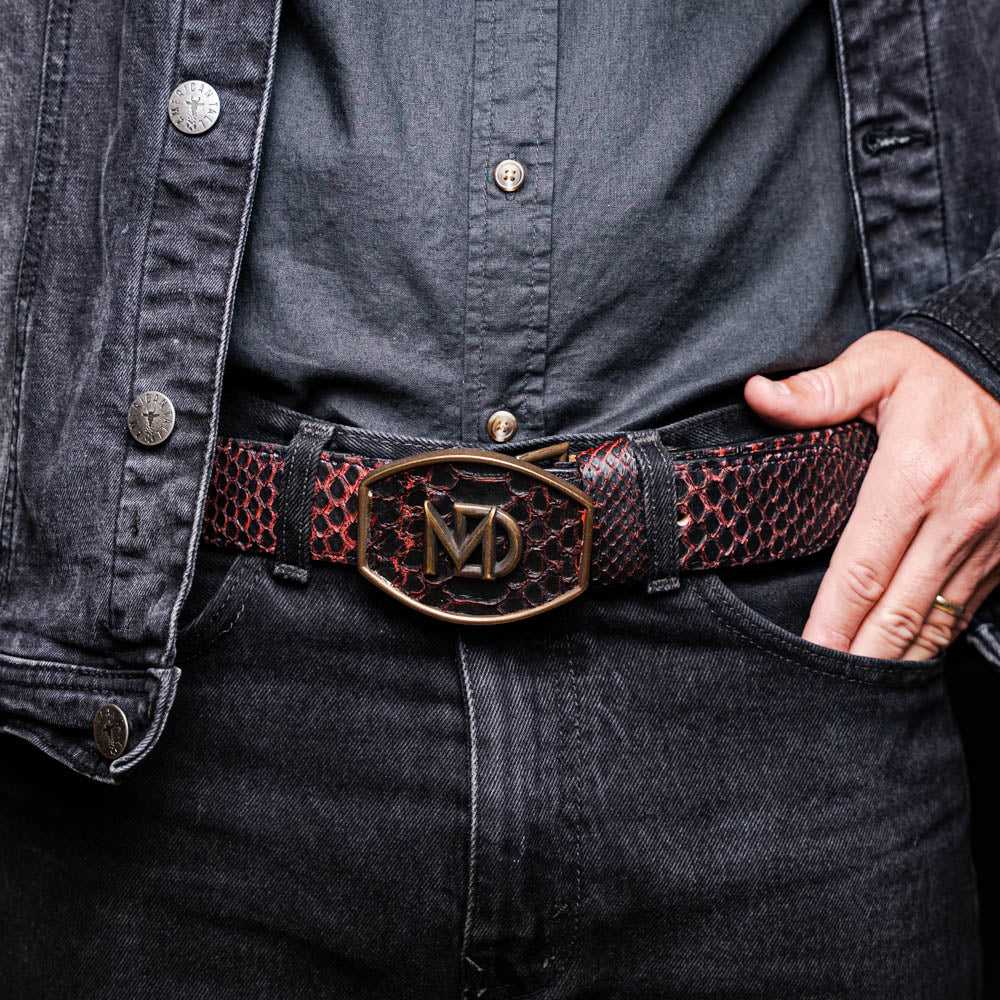 The Arkansas Belt BlackCherry by Marco Di Milano is a black and red genuine python skin western belt with a gold "MD" buckle on a white background.