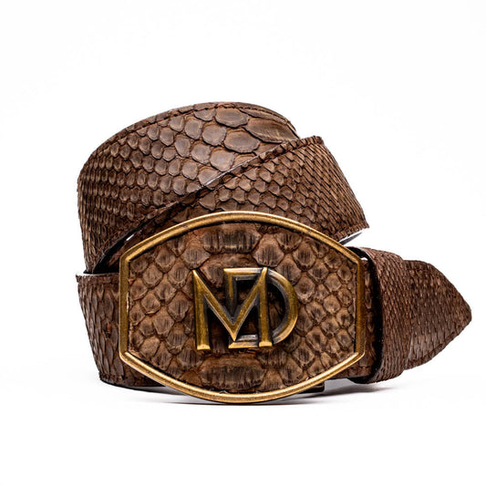 The Arkansas Belt Brown by Marco Di Milano is a handcrafted western accessory in genuine python skin, featuring a gold-tone buckle with overlapping "M" and "D" letters.