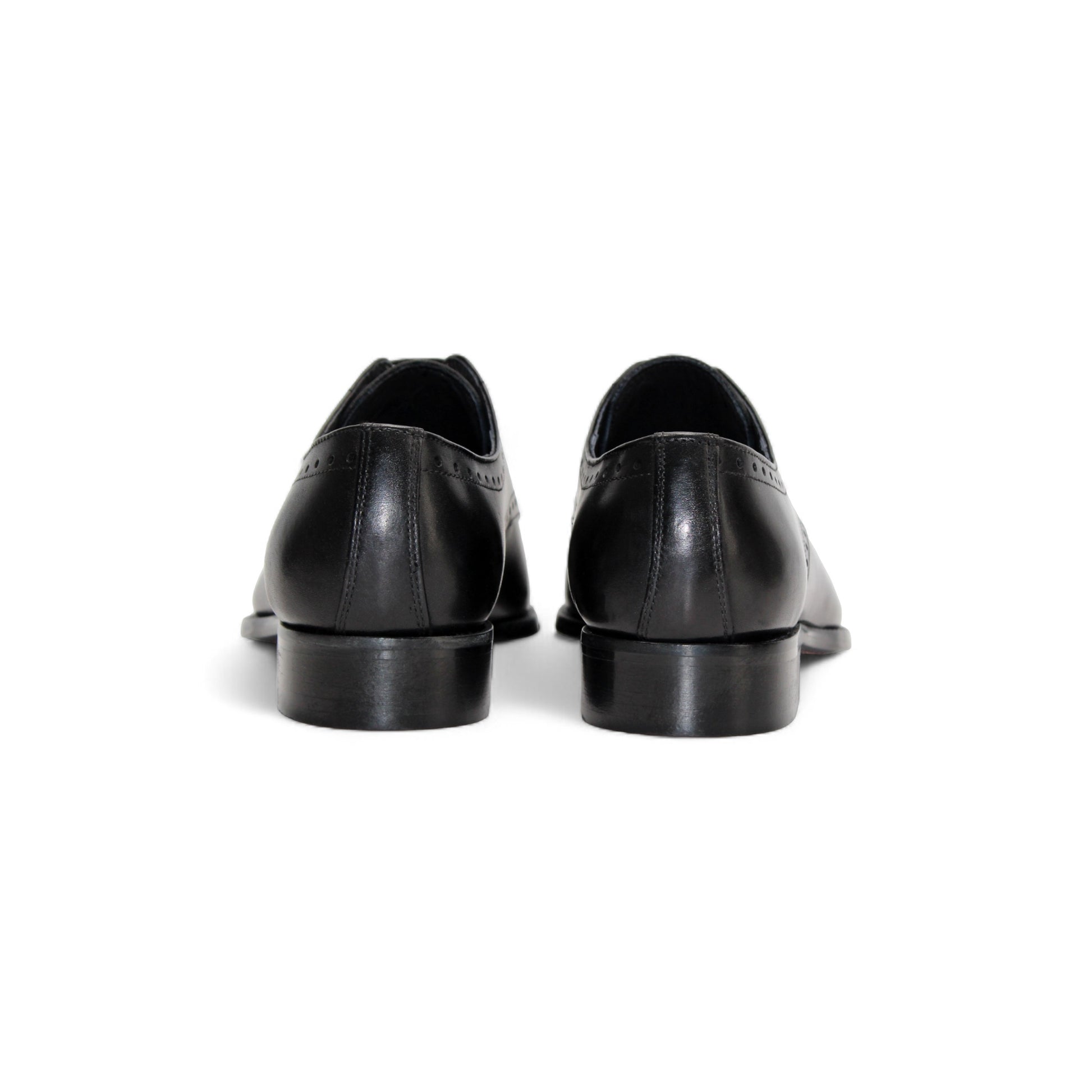 The Duca Di Matiste Duca Arpino Black is a black Italian leather dress shoe with a low heel, lace-up closure, and subtle brogue detailing, displayed in side profile on a white background.