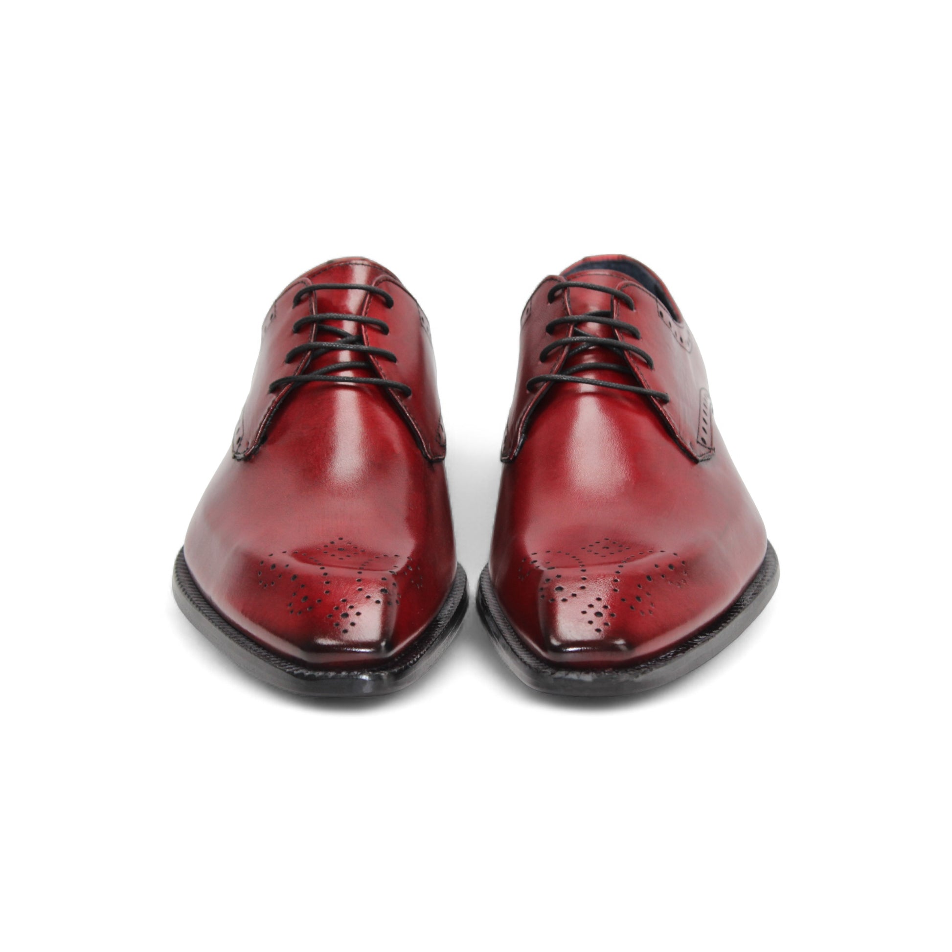 A single Duca Arpino Red dress shoe by Duca Di Matiste, crafted from Italian leather with black decorative perforations and laces, shown in profile on a white background.