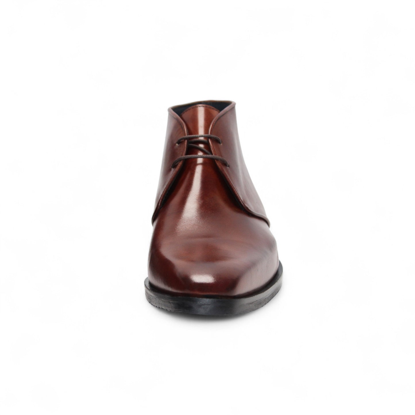 The Firmani Asher Brandy by Firmani is a brown leather dress boot with Italian craftsmanship, two eyelets, a low heel, and a black sole, shown in profile on a plain white background.