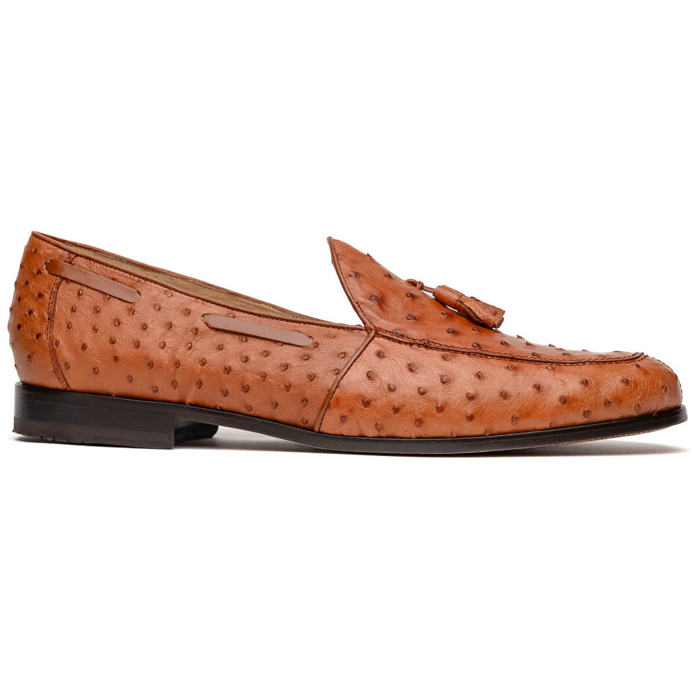A pair of luxury men's footwear—Aubiere Cognac loafers by Marco Di Milano—boasts rich brown ostrich leather, with one shoe upright and the other on its side to reveal a sole stamped "Marco Di Milano.