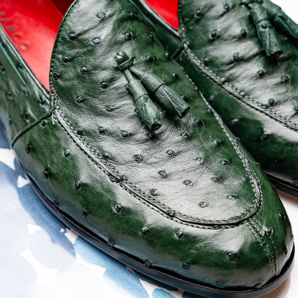 The Marco Di Milano Aubiere Forest Green features luxury ostrich tassel loafers with genuine quill texture, red interior lining, and tan leather soles.