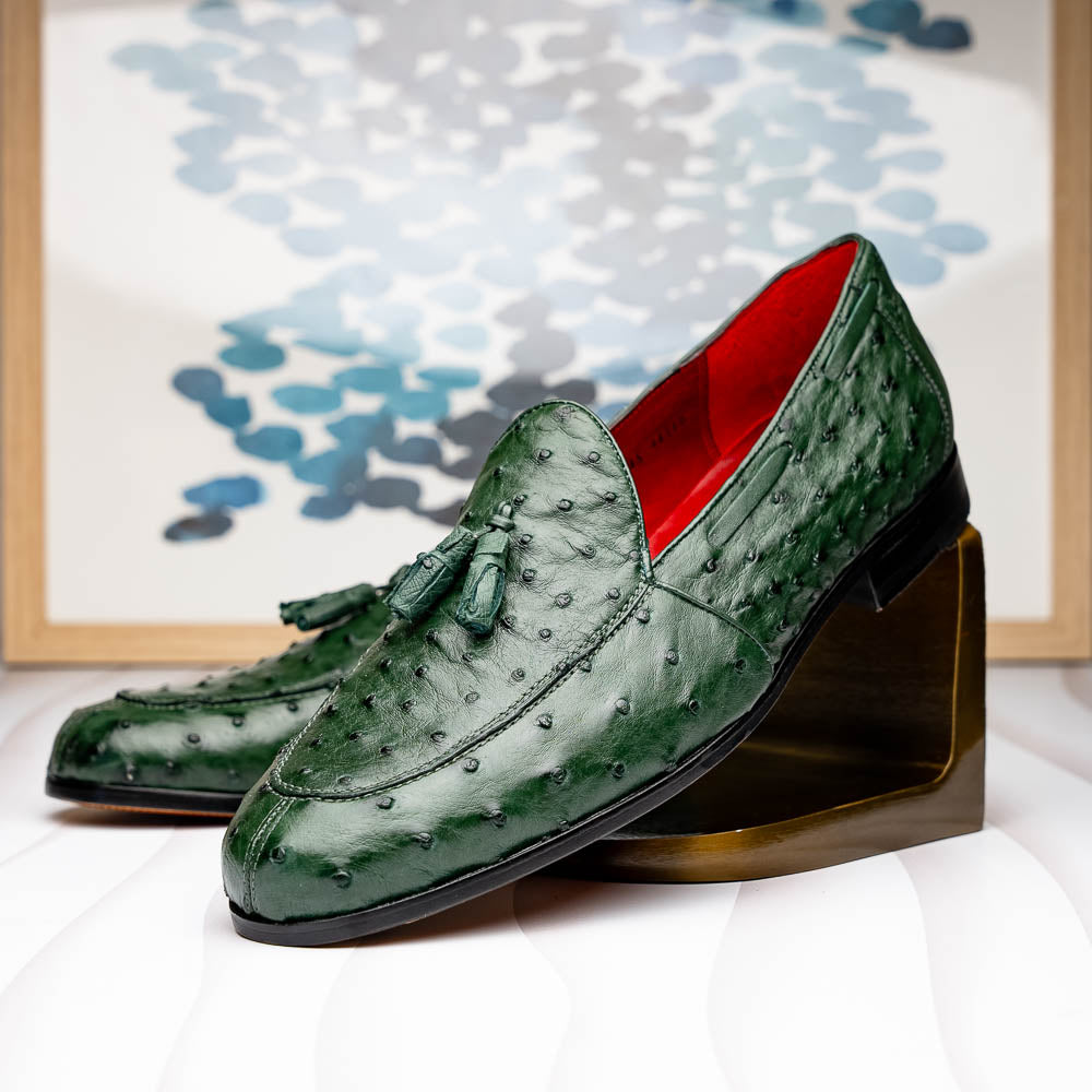 The Marco Di Milano Aubiere Forest Green features luxury ostrich tassel loafers with genuine quill texture, red interior lining, and tan leather soles.