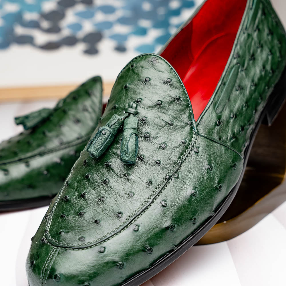 The Marco Di Milano Aubiere Forest Green features luxury ostrich tassel loafers with genuine quill texture, red interior lining, and tan leather soles.