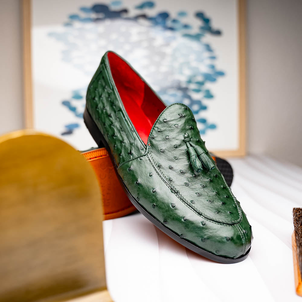 The Marco Di Milano Aubiere Forest Green features luxury ostrich tassel loafers with genuine quill texture, red interior lining, and tan leather soles.