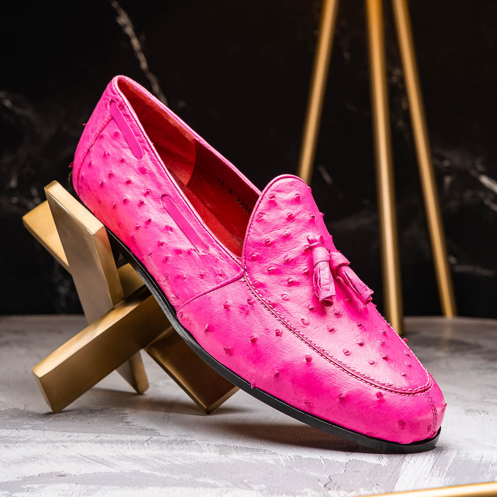 Aubiere Pink by Marco Di Milano: genuine ostrich quill men's tassel loafers in bright pink, with one shoe upright and the other displaying the sole—luxurious footwear that makes a statement.
