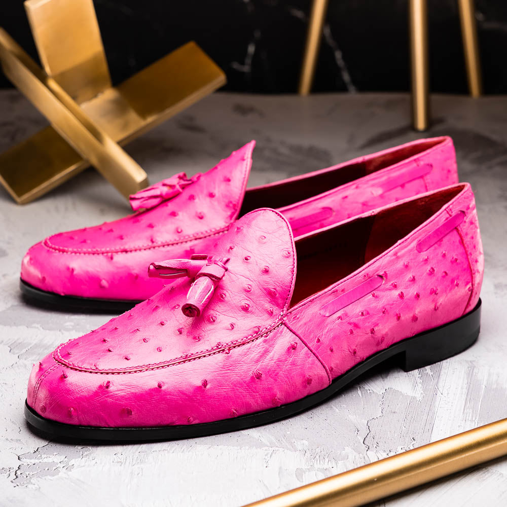 Aubiere Pink by Marco Di Milano: genuine ostrich quill men's tassel loafers in bright pink, with one shoe upright and the other displaying the sole—luxurious footwear that makes a statement.