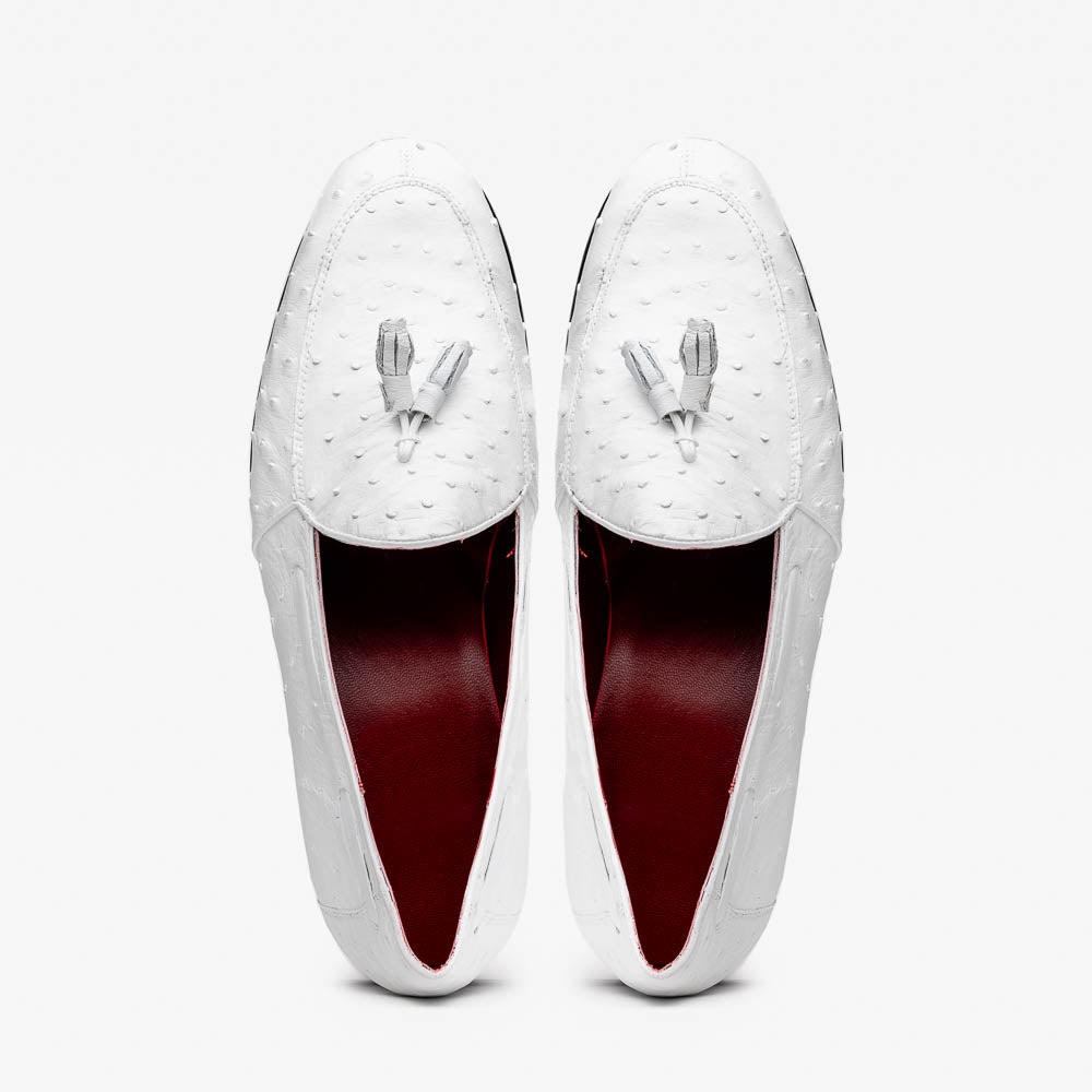 A pair of luxury men’s loafers—Marco Di Milano Aubiere White—crafted in textured white leather with ostrich tassels, red interior lining, tan soles; one shoe rests on its side showing the “Marco Di Milano” logo.