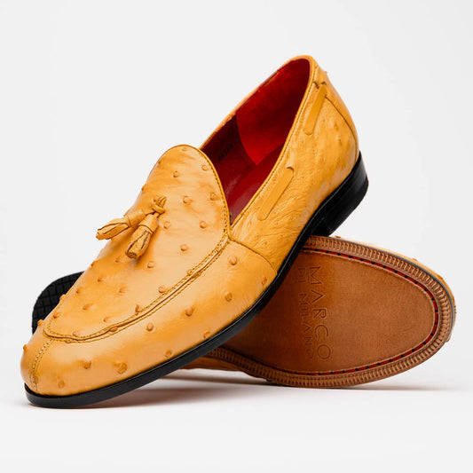 The Aubiere Buttercup by Marco Di Milano are yellow ostrich tassel loafers with red interior lining and branded leather soles, expertly crafted from genuine ostrich, presented against a white background.