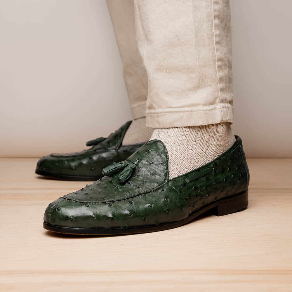 The Marco Di Milano Aubiere Forest Green features luxury ostrich tassel loafers with genuine quill texture, red interior lining, and tan leather soles.