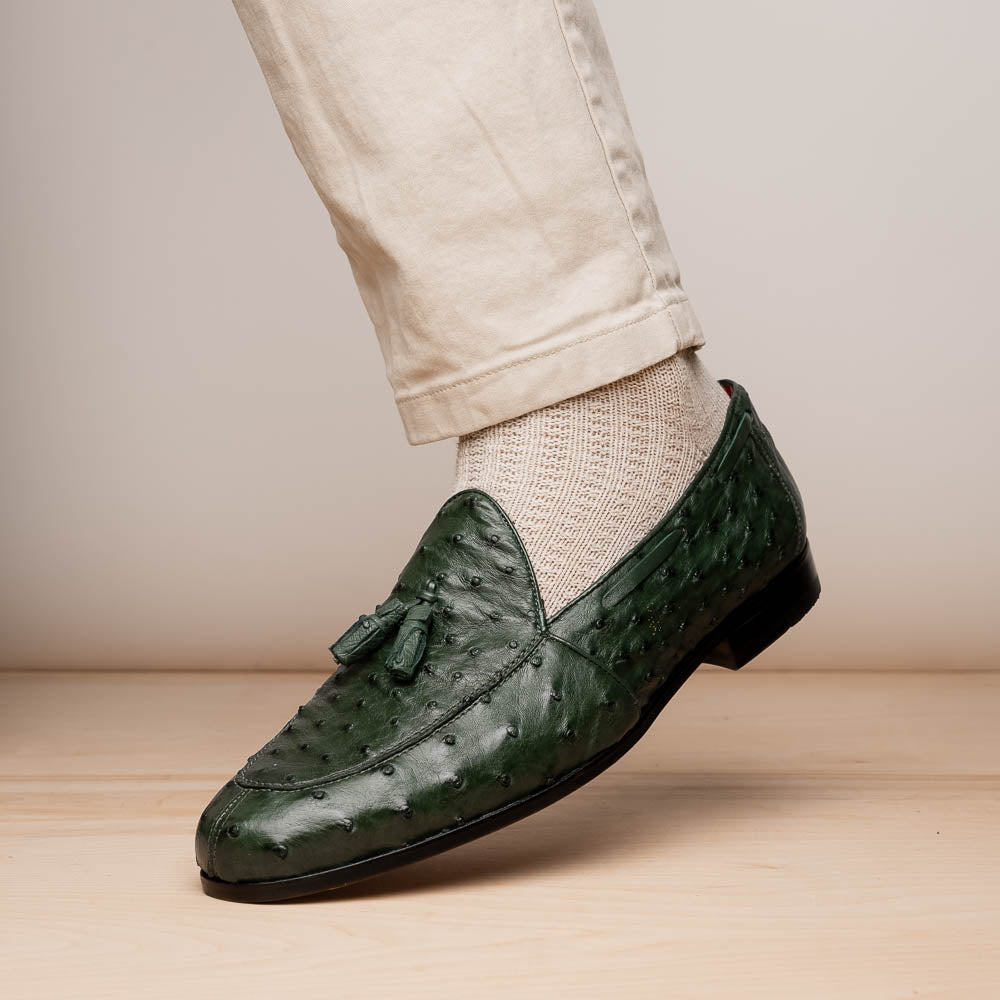 The Marco Di Milano Aubiere Forest Green features luxury ostrich tassel loafers with genuine quill texture, red interior lining, and tan leather soles.