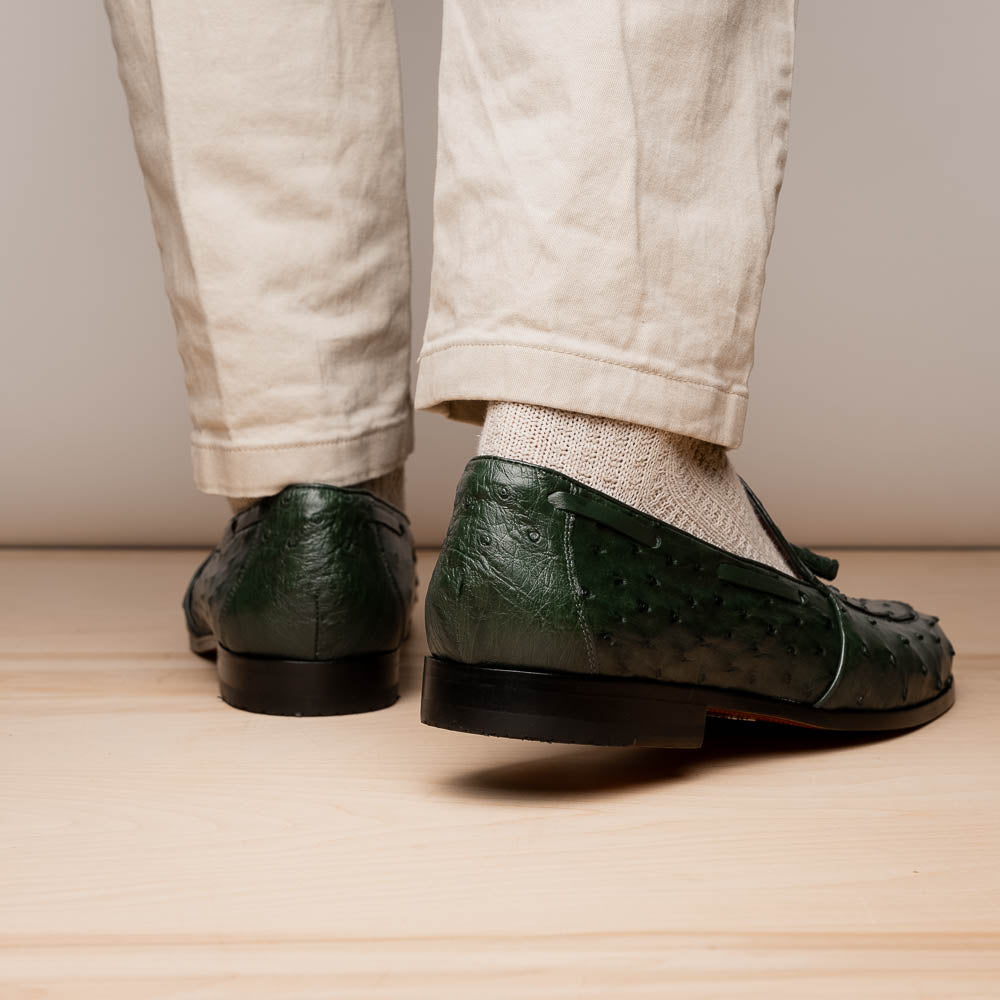 The Marco Di Milano Aubiere Forest Green features luxury ostrich tassel loafers with genuine quill texture, red interior lining, and tan leather soles.