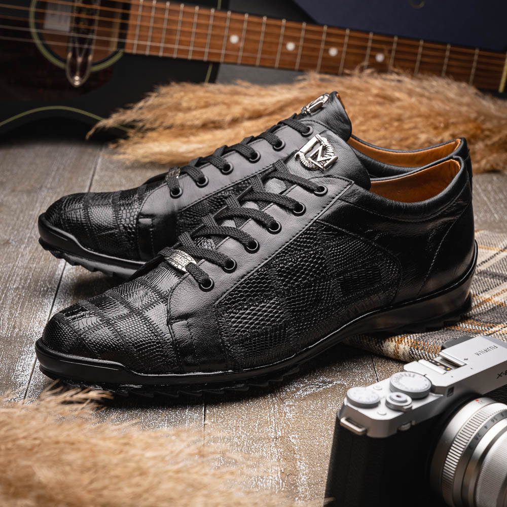 The Bari Black by Marco Di Milano: black leather lace-up dress shoes with textured detailing and a hand-painted finish; one shoe rests against the other to reveal its sole—a true statement in luxury footwear.