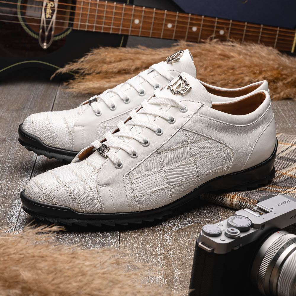 The Bari White by Marco Di Milano: white lace-up sneakers with a textured pattern, black rubber soles, and a metallic logo on the tongue. Displayed upright and angled to show the sole—luxury footwear defined.