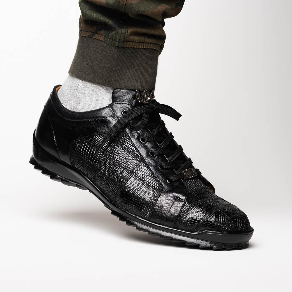 The Bari Black by Marco Di Milano: black leather lace-up dress shoes with textured detailing and a hand-painted finish; one shoe rests against the other to reveal its sole—a true statement in luxury footwear.