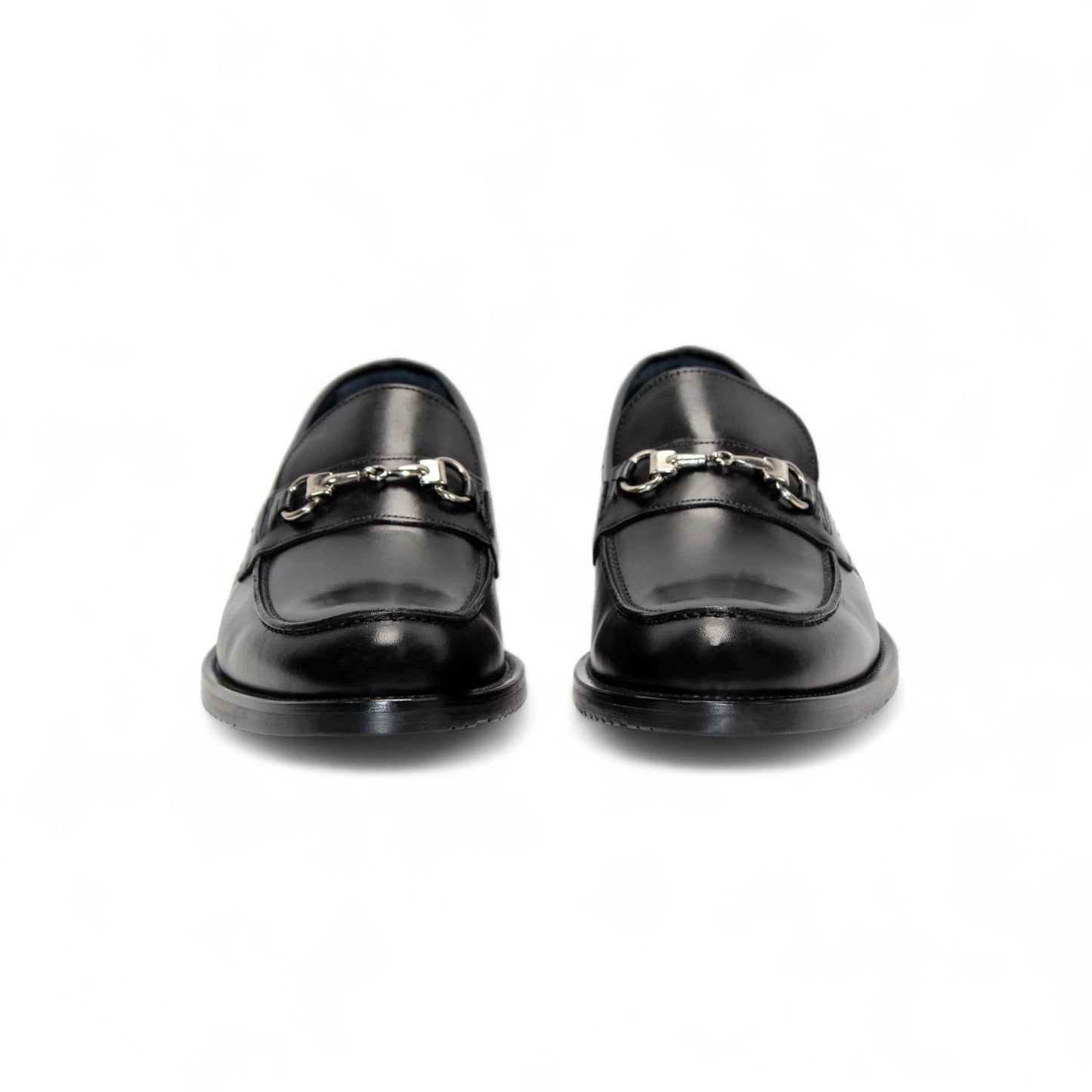 The Firmani Ben Black loafer by Firmani, made from genuine black leather, features a low heel and metal bit detail, shown in side profile against a white background for a classic modern look.