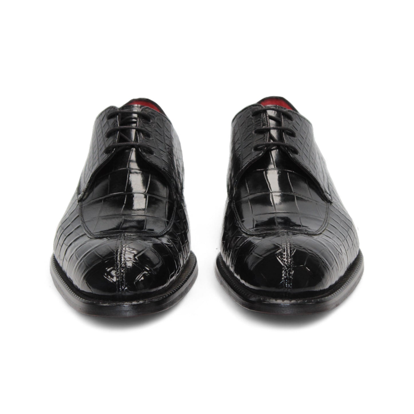 The Fennix Benjamin Black by Fennix of Italy is a glossy black luxury shoe with a crocodile-patterned finish and laces, crafted from genuine alligator leather, shown in a side view against a white background.