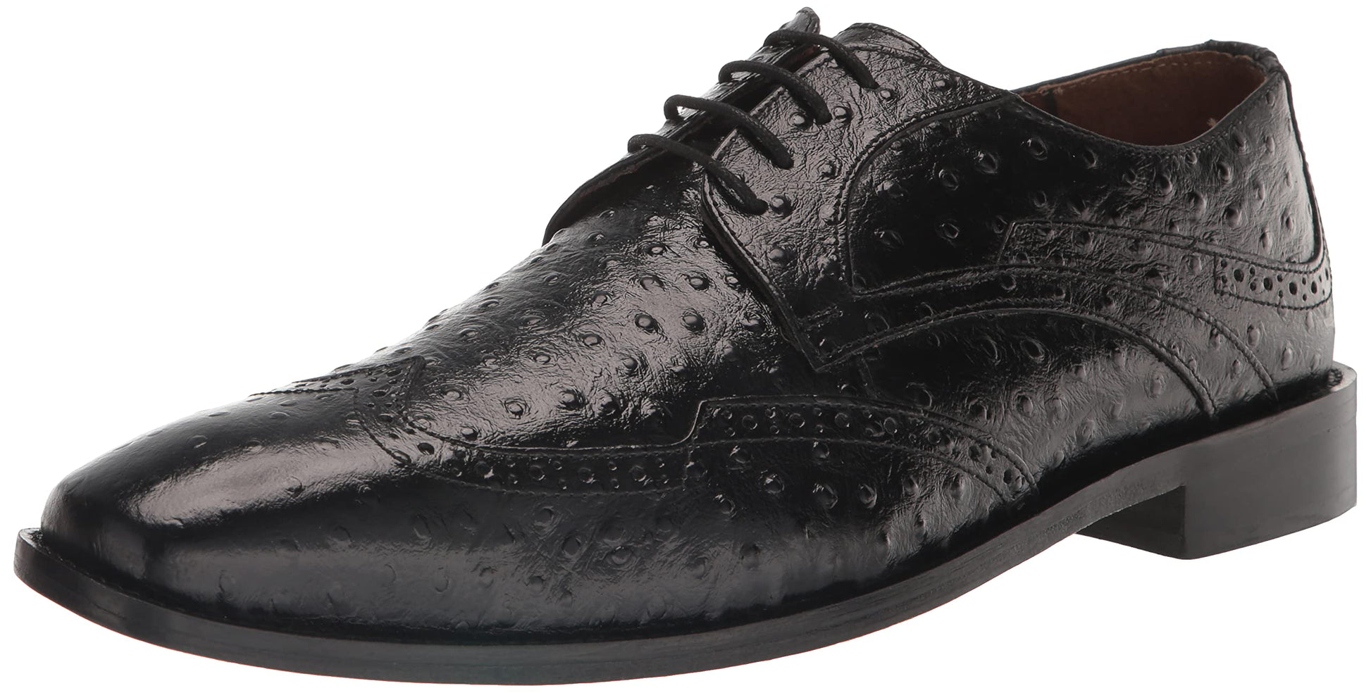 The Stacy Adams Gennaro Wingtip Oxford in olive is a men’s dress shoe featuring brogue detailing and a textured ostrich quill leather pattern, complete with laces and a low heel.