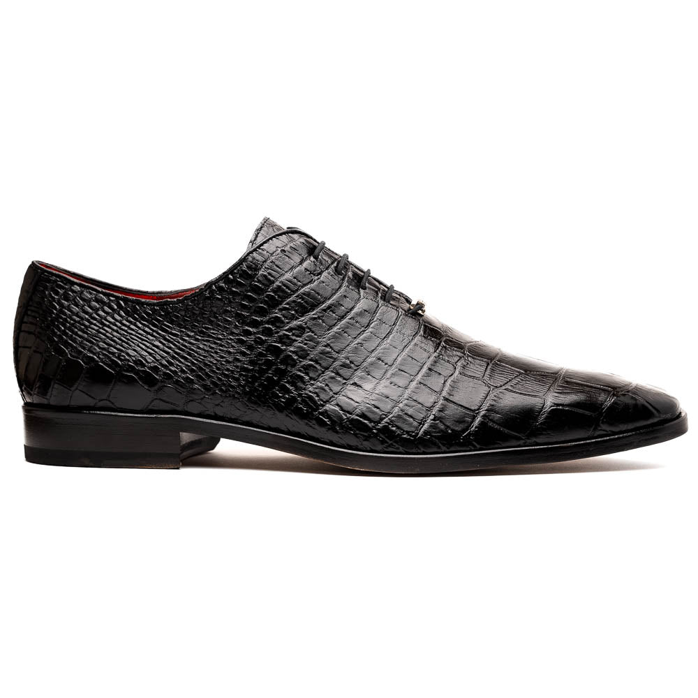 The Marco Di Milano Bono Black features a pair of luxury dress shoes in a crocodile pattern—one upright and one displaying a brown branded sole.