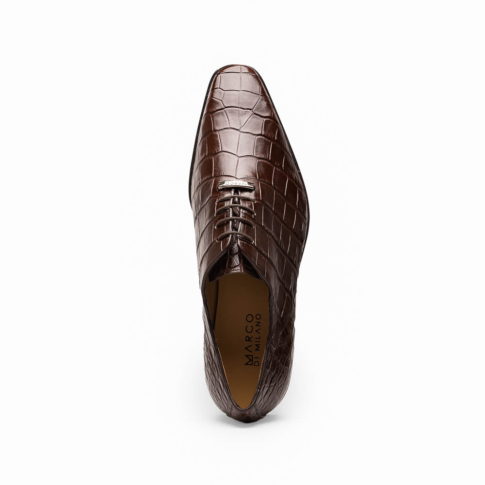 The Bono Brown by Marco Di Milano: genuine alligator Oxfords in brown—one upright displaying laces, the other showing the sole and stitching—a stunning example of luxury footwear.
