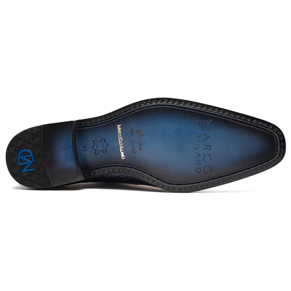 The Bono Navy by Marco Di Milano: luxury navy blue dress shoes with crocodile-patterned leather, black soles, and red inner lining. One shoe is positioned to showcase the sole.