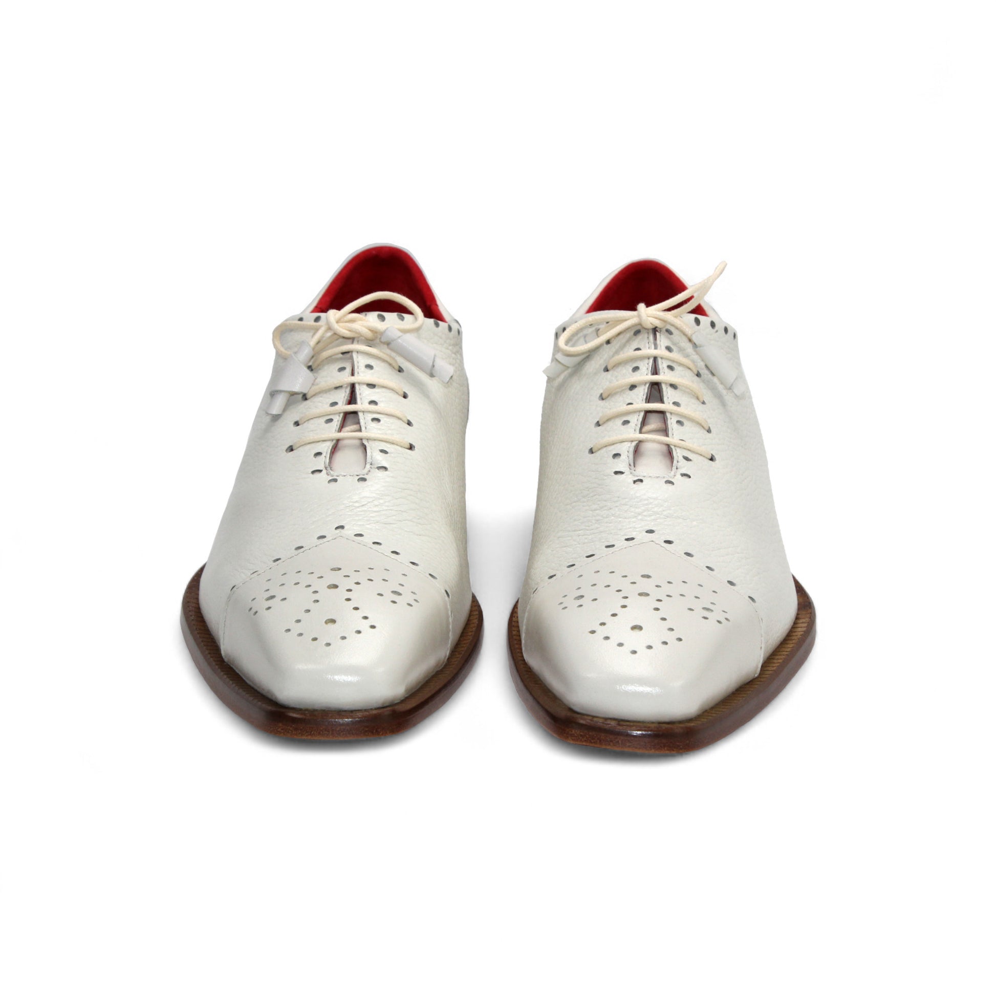 The Emilio Franco Bosco Bone is a handcrafted Italian oxford shoe in white genuine leather, featuring decorative perforations, a low wooden heel, red inner lining, and shown in profile on a white background.