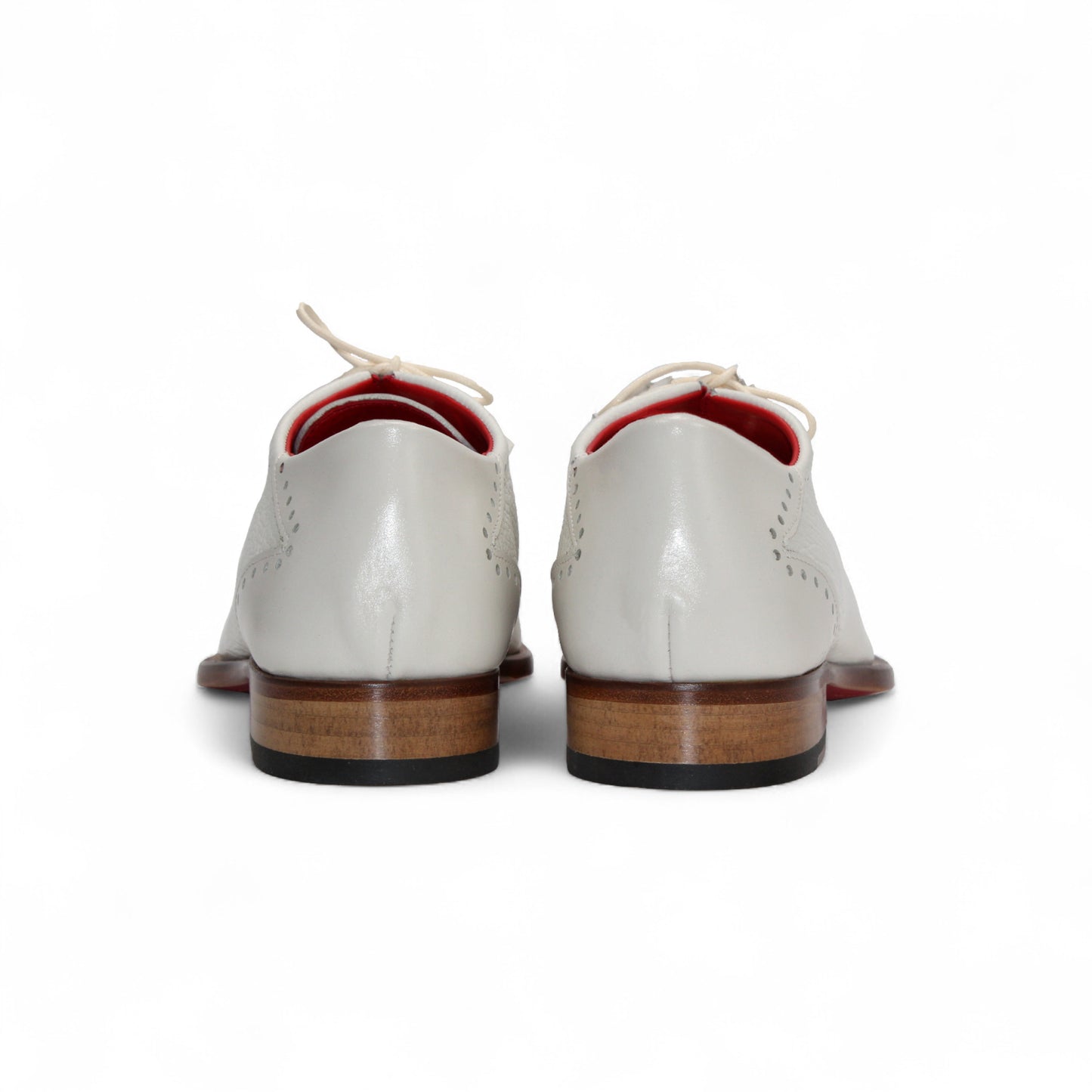 The Emilio Franco Bosco Bone is a handcrafted Italian oxford shoe in white genuine leather, featuring decorative perforations, a low wooden heel, red inner lining, and shown in profile on a white background.