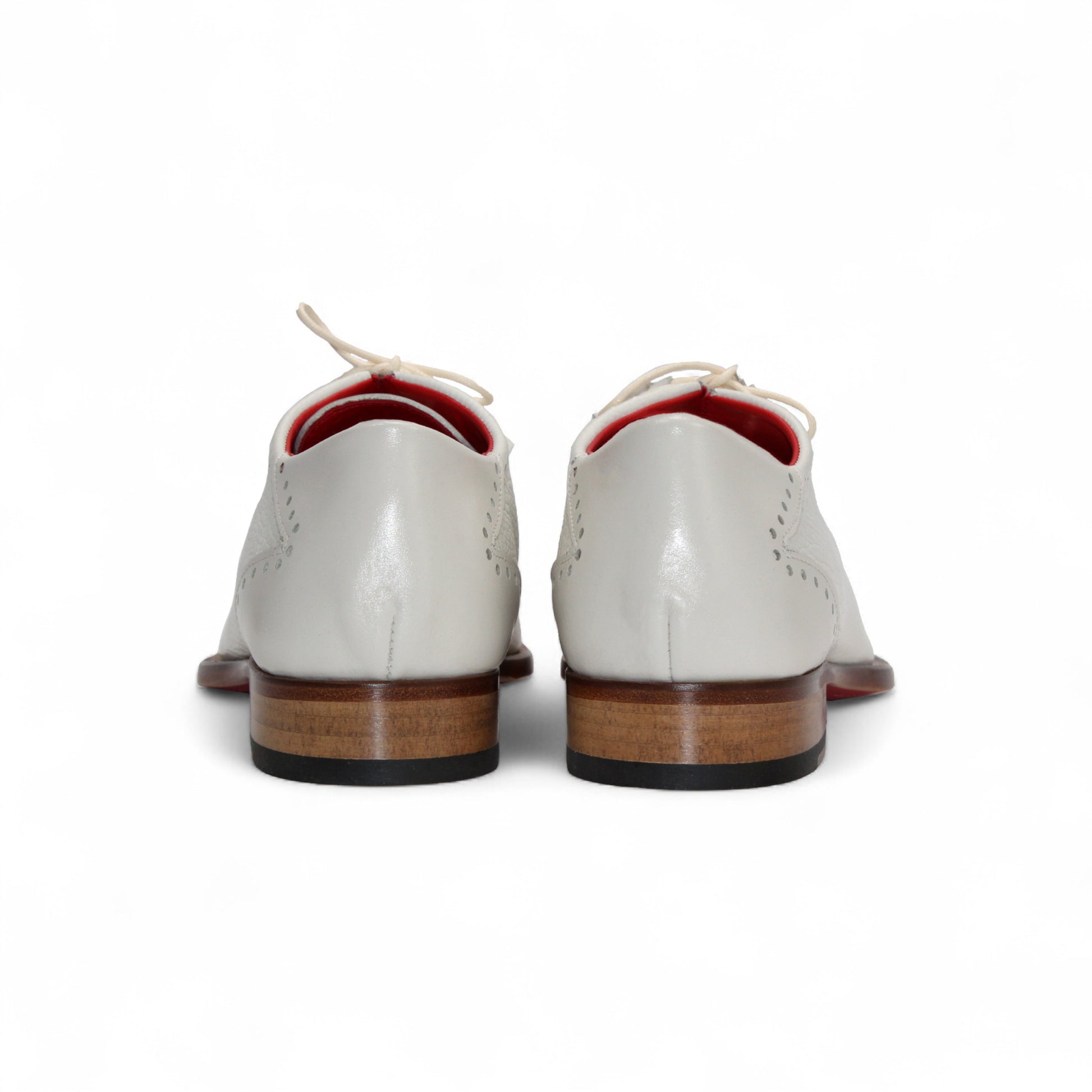 The Emilio Franco Bosco Bone is a handcrafted Italian oxford shoe in white genuine leather, featuring decorative perforations, a low wooden heel, red inner lining, and shown in profile on a white background.