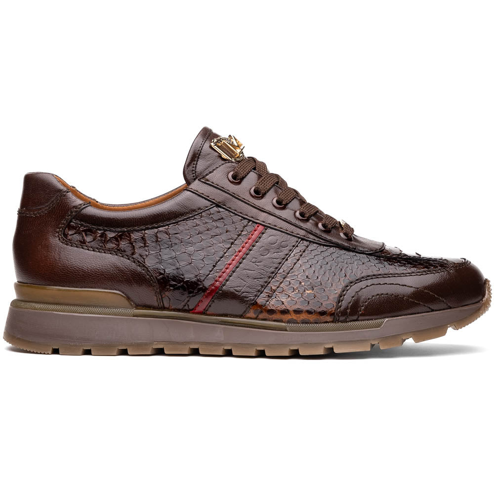 The Marco Di Milano Brescia Brown sneakers feature dark brown python-textured leather, a gold logo on the tongue, and a red stripe detail, with one shoe propped on the other—ideal for luxury footwear enthusiasts.