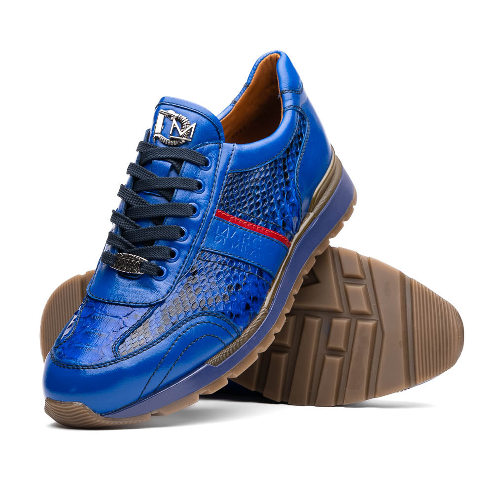The Brescia Electric Blue sneakers by Marco Di Milano feature blue python leather, black laces, a red stripe, hand-painted side panels, and brown rubber soles—displayed with one shoe upright and the other on its side.