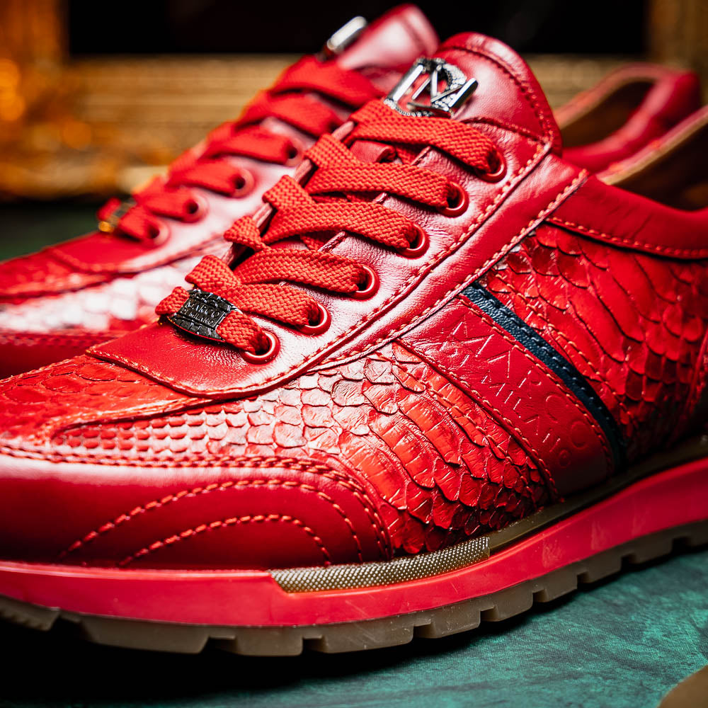 The Marco Di Milano Brescia Red sneakers feature red leather with a python-inspired texture, rubber sole, and lace-up design—shown with one shoe upright and the other displaying the sole.