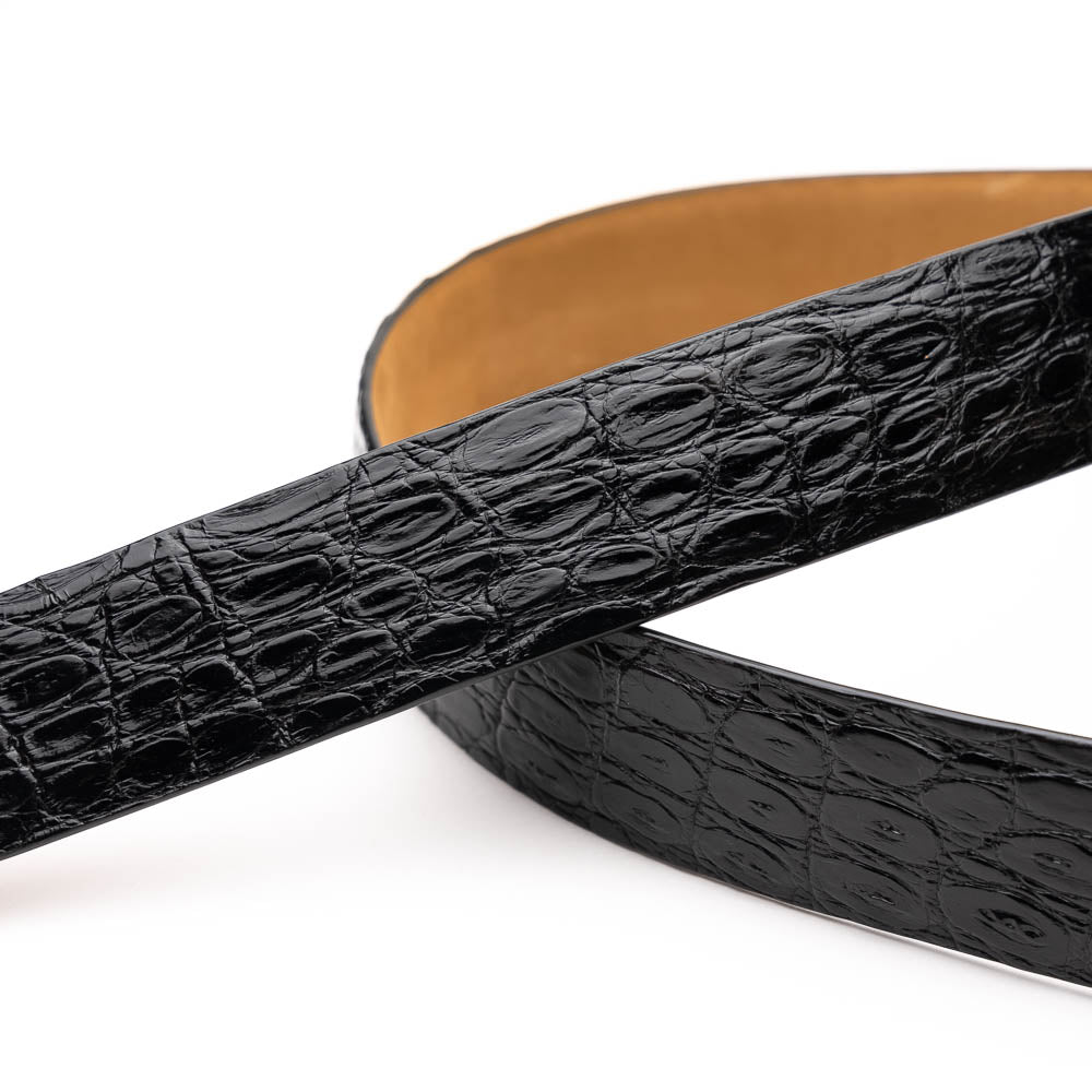 The Massimo Belt Black by Marco Di Milano is crafted from black crocodile-pattern leather with a metallic buckle engraved "Marco Di Milano" and "MD," featuring hand-painted finishes to complement luxury footwear collections.