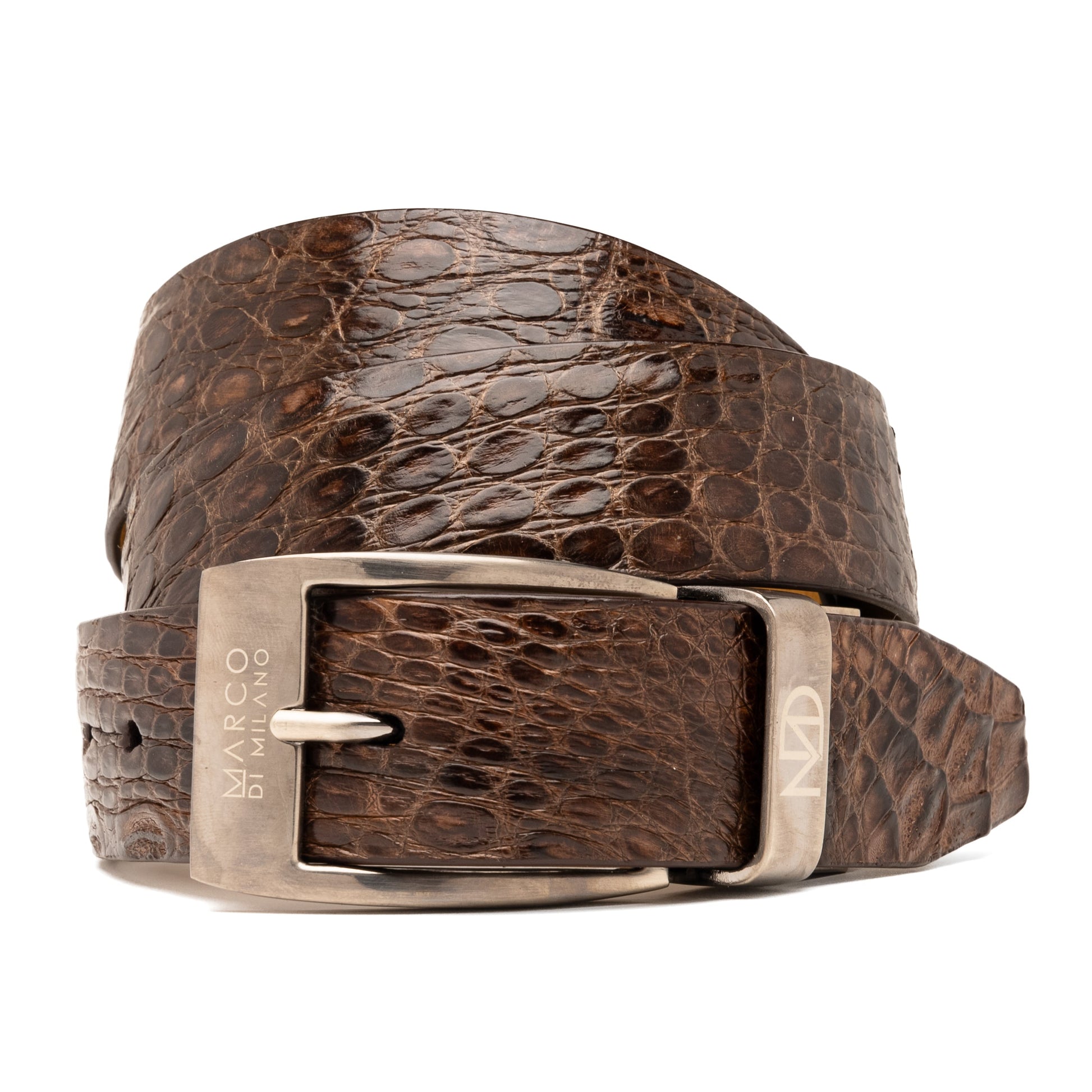 The Massimo Belt Brown by Marco Di Milano features an exotic caiman flank design and a silver engraved buckle—an elegant accessory to pair with your luxury footwear collection.