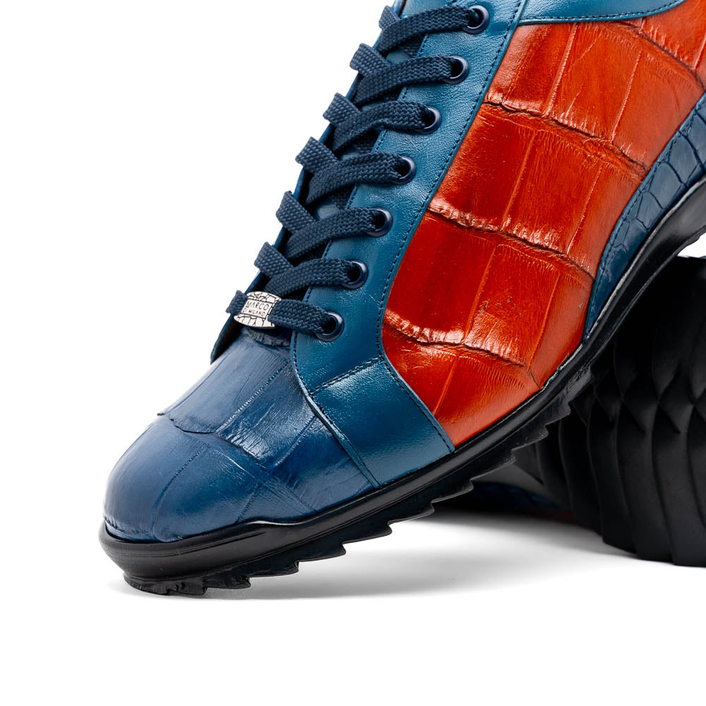 The Marco Di Milano Cairo Blue Jeans/Honey low-top sneakers showcase blue and orange genuine alligator leather with black laces and textured black rubber soles for a luxurious look.