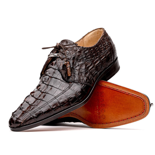 A pair of Marco Di Milano Cancun Brown derby shoes in dark brown hornback caiman crocodile leather—one displays the textured upper, while the other reveals the hand-painted exotic sole embossed with the brand.