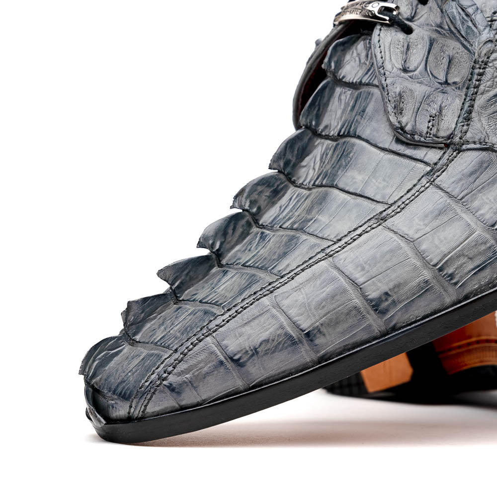 The Marco Di Milano Cancun Gray is a luxury men's derby shoe made from genuine hornback caiman crocodile leather in gray, with black laces, red lining, and brown leather soles—an exquisite choice in exotic footwear.