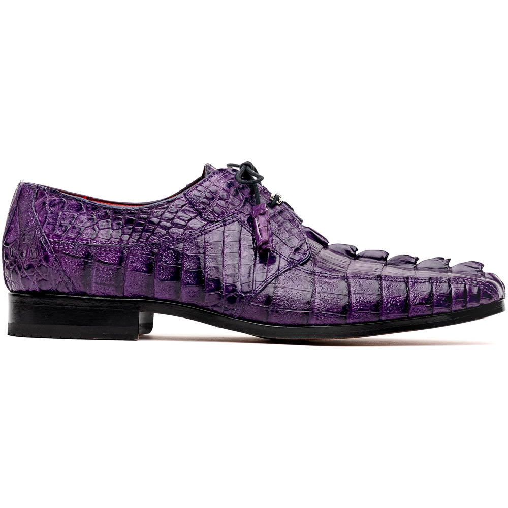 The Marco Di Milano Cancun Purple is a luxurious pair of derby shoes crafted from genuine hornback caiman crocodile leather, hand-painted in purple with black laces—one shown upright, the other displaying a tan branded sole.